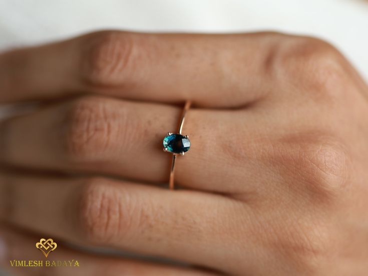 Teal sapphire stacking ring, blue sapphire ring, Dainty sapphire ring, stacking ring, gold stackable ring, dainty ring, Parti sapphire ring Same design can be made also with other custom gemstones per request.  Product details: - Solid gold - approx. 4x6mm Parti sapphire - Band size is 1.3mm Ring size - US 3 to US 9 (for smaller or larger ring size, please contact) Please select your size at the drop down menu.  All orders will be shipped via DHL or FedEx express shipping. Thanks! Check out our Instagram and get exciting offers https://www.instagram.com/vimleshbadaya Peacock Sapphire, Teal Sapphire Ring, Ring Blue Sapphire, Parti Sapphire, Sapphire Solitaire Ring, Saphir Ring, Teal Sapphire, Gold Rings Stackable, Sapphire Band