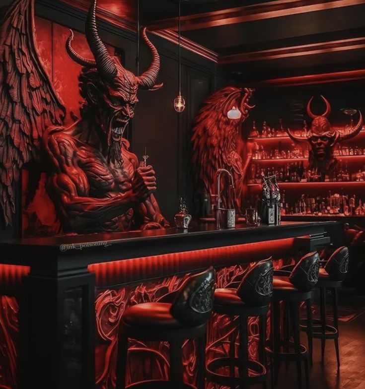 a bar with red lighting and demon statues