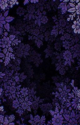 an abstract purple and black background with leaves