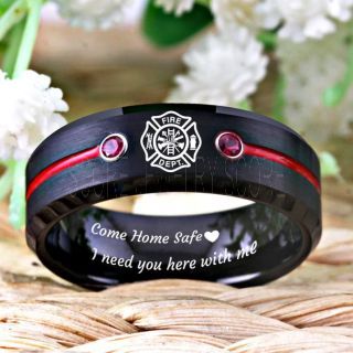 a firefighter's ring with the words come home safe i need you here