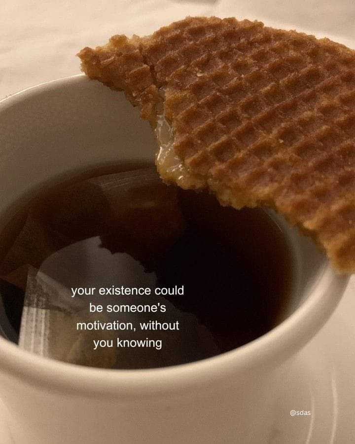 a waffle sandwich in a coffee cup with a quote on the side that says, your experience could be someone's motivational