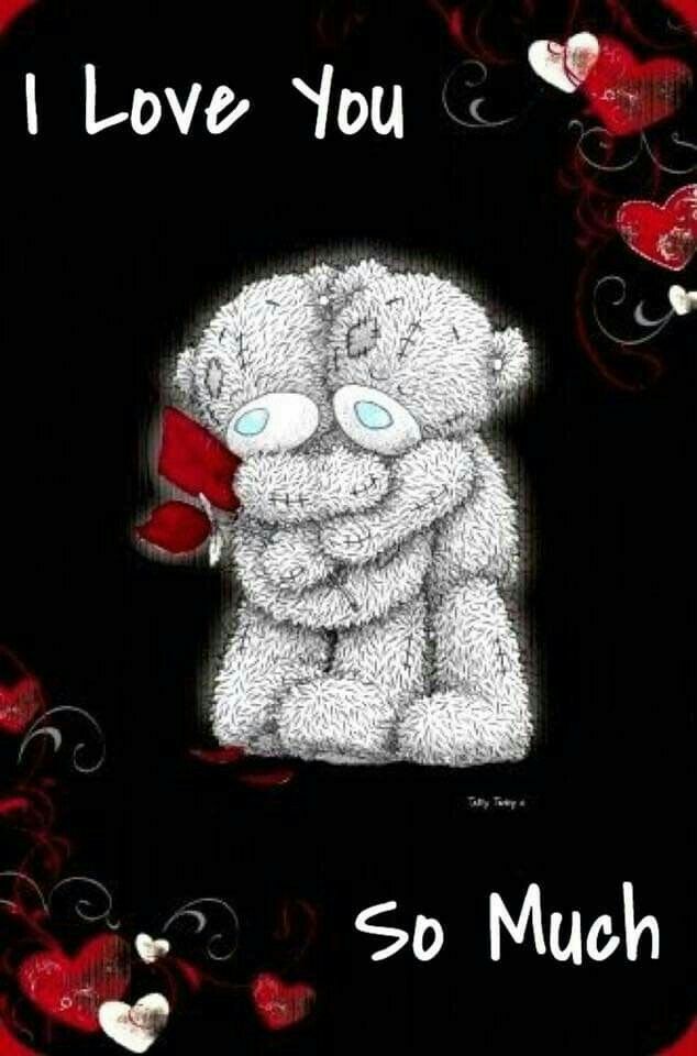 a white teddy bear sitting on top of a black background with hearts in the air