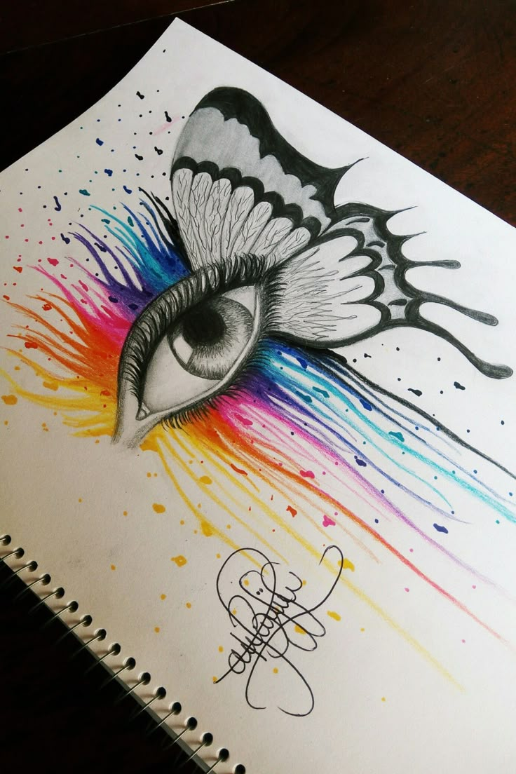 a drawing of an eye with colorful paint splatters on it and a butterfly