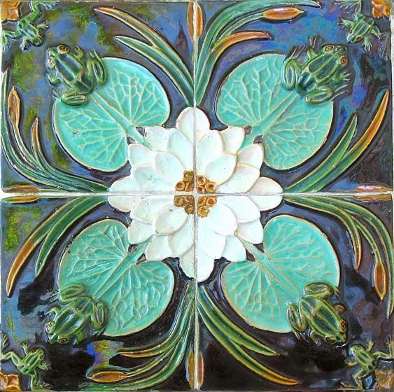 an artistic tile design with flowers and leaves on blue ground, painted in green and white colors