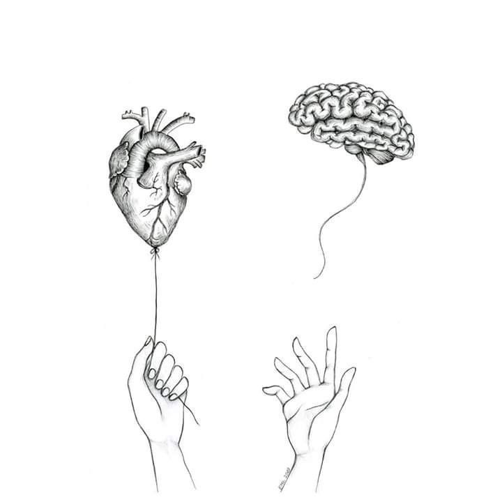 two hands holding a heart balloon and a brain in the shape of a human head