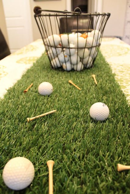 some golf balls and tees on the grass