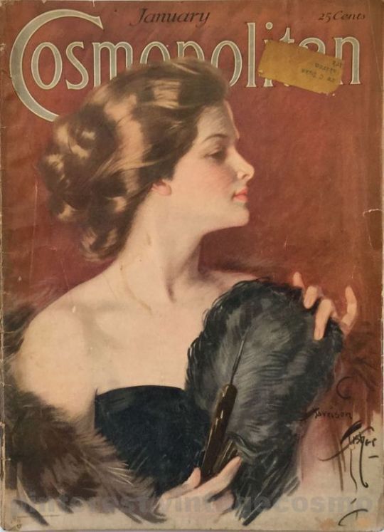 an old fashion magazine cover with a woman in black dress holding a feathered fan