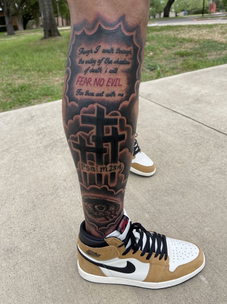 a man with a tattoo on his leg