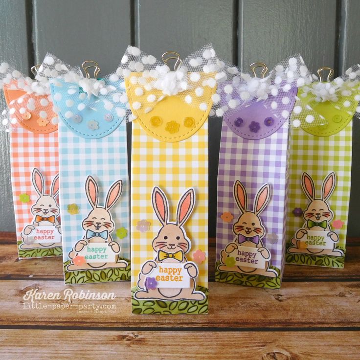 four colorful bags with bunny images on them