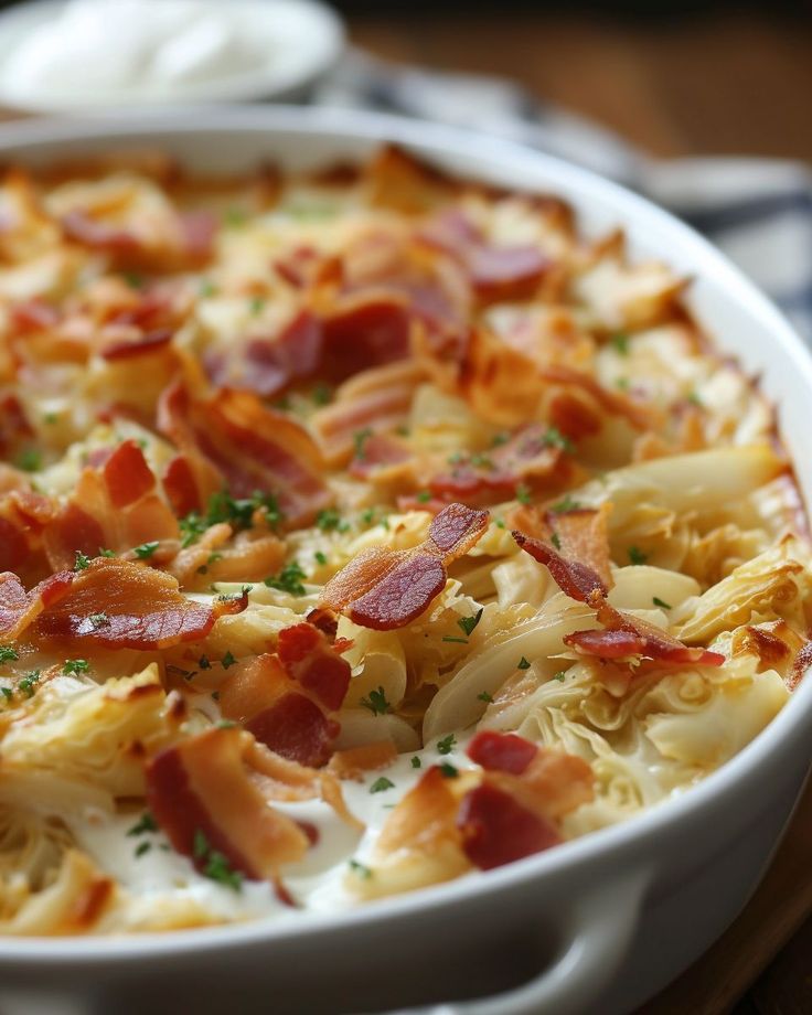 a casserole dish with bacon and cheese in it