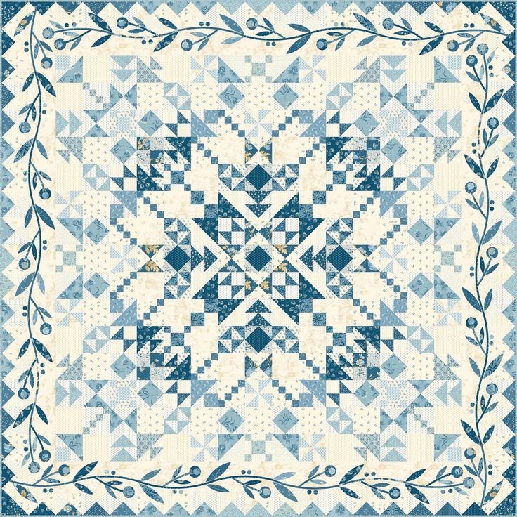 a blue and white quilt with an intricate design on the front, in square shape