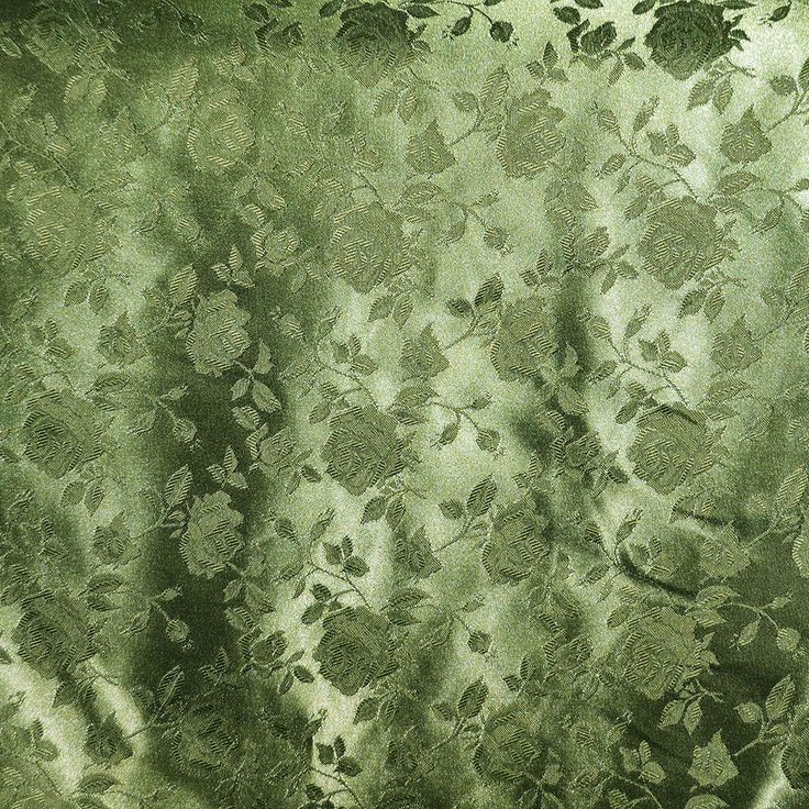 an image of a curtain with leaves and flowers on it's side in the sunlight