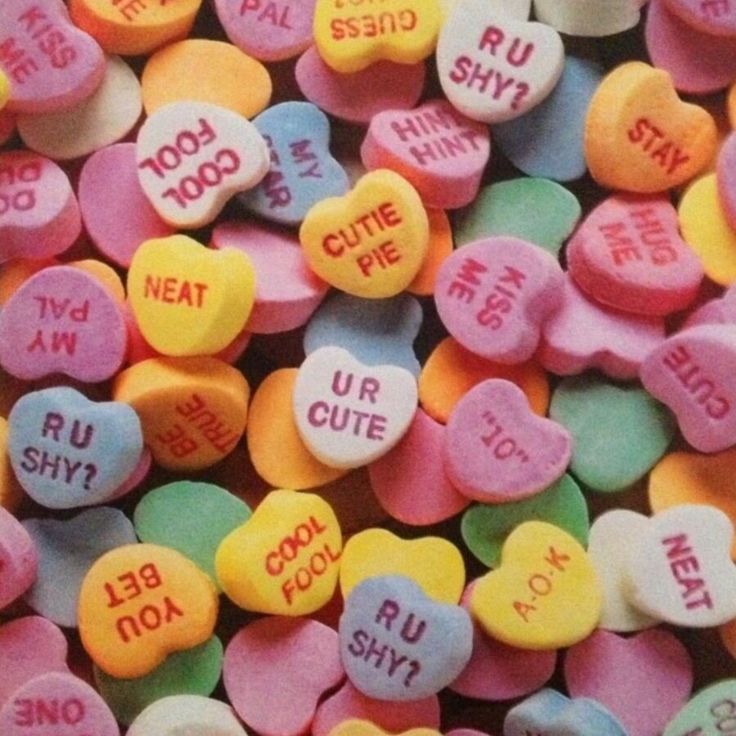 candy hearts with words written on them