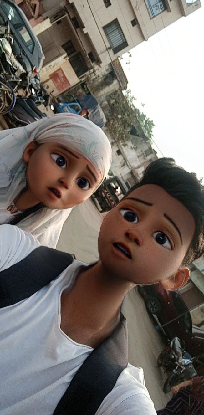 two young children standing next to each other in front of a tall building on a city street