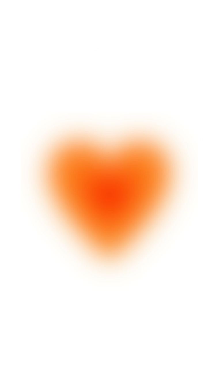 an orange heart shaped object on a white background