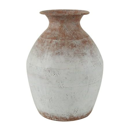 a white and brown vase on a white background