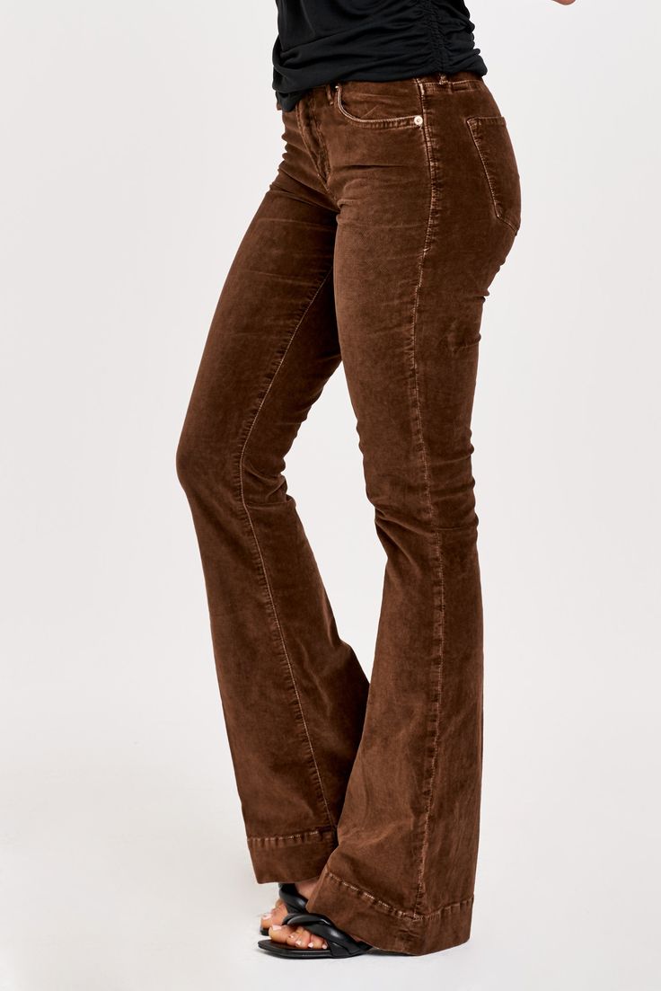 High rise flare leg jeans. It's the lovable fit that sits slightly lower on the waist and fitted skinny in the hips through the knee. Full inseam on stretch velveteen brushed for softness in designer color palettes, accented with wide hem opening.9 1/2" Front Rise (include waistband), 21" Leg Opening, 34" inseam (Size 27) 98% COTTON 2% SPANDEX Machine wash cold, Tumble dry low Imported Zip fly and button closure Five-pocket style Brown Flare Jeans With Five Pockets, High Rise Cotton Flares For Fall, Trendy Brown Wide Leg Flare Jeans, Trendy Brown Wide-leg Flare Jeans, High Rise Brown Flare Jeans For Fall, Mid-rise Brown Flare Jeans For Fall, Brown Flare Jeans With Five Pockets For Fall, Trendy Brown Flare Jeans For Fall, Brown Cotton Flare Jeans With Five Pockets