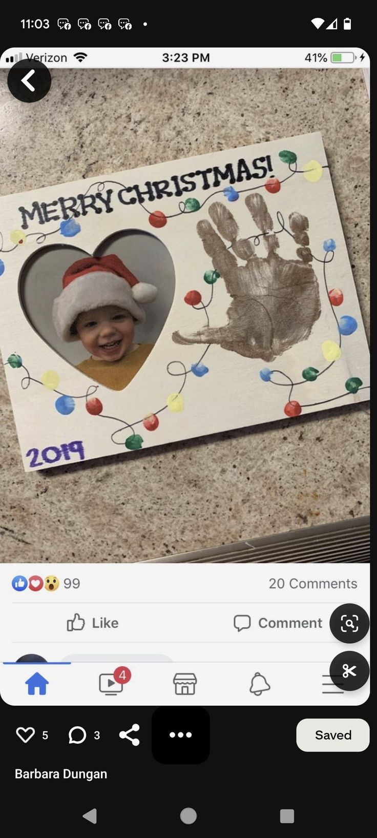 a christmas card with an image of a baby's handprint