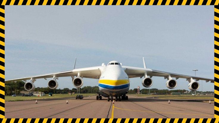 a large jetliner sitting on top of an airport tarmac