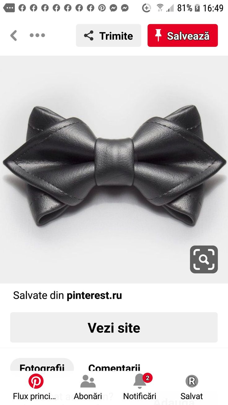 a black bow tie is shown on an iphone