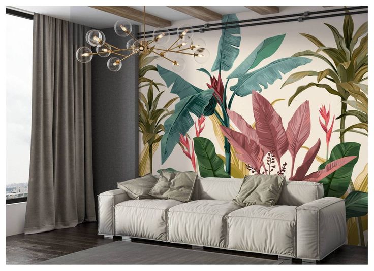 a living room with a white couch and large wall mural on the wall behind it