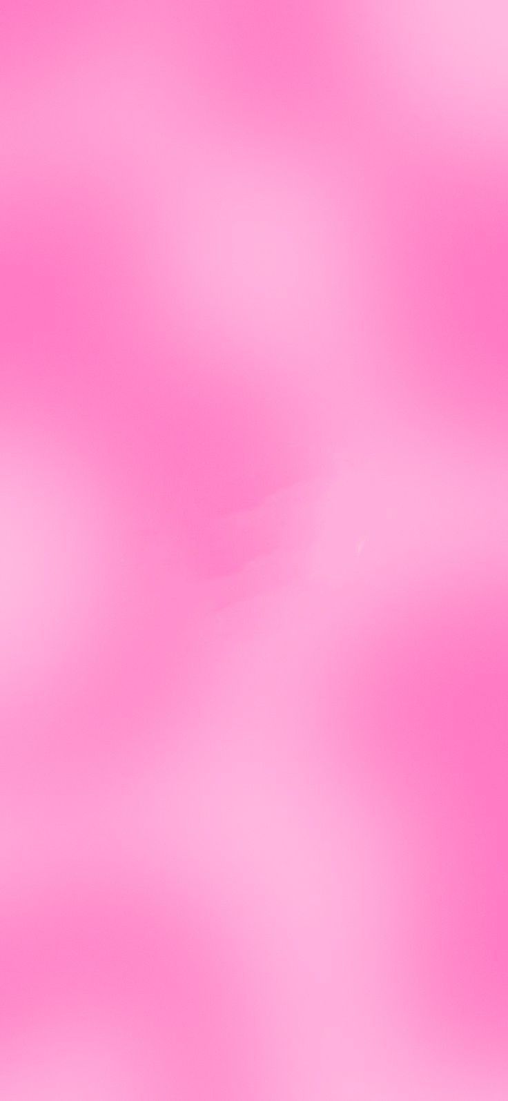 a blurry pink background is shown in this image