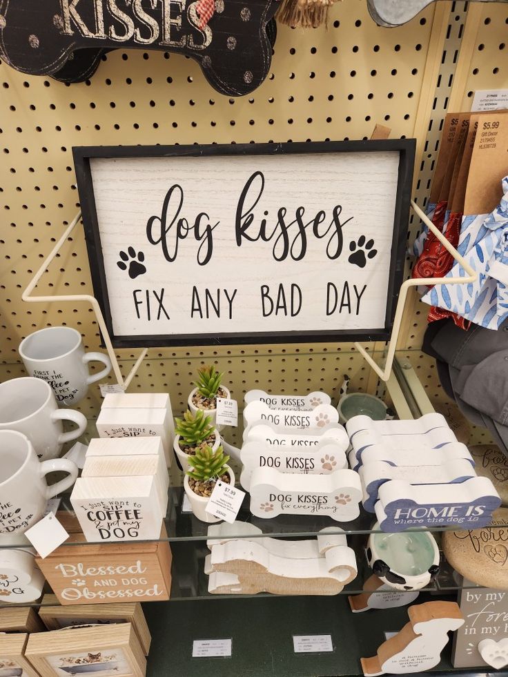 dog kisses fix any bad day sign and other items for sale at a flea market