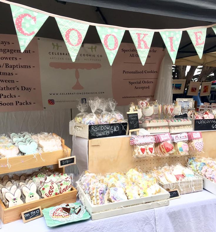 a table topped with lots of cakes and desserts