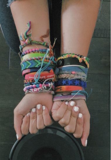 Aesthetic Wrist Bracelets, Bracelet Sleeve, Camp Wrist, Wrist Band Bracelets, Lots Of Bracelets On Wrist Aesthetic, Bracelet Combos On Wrist, Wrist With Bracelets, Camping Bracelet, Wrist Of Bracelets