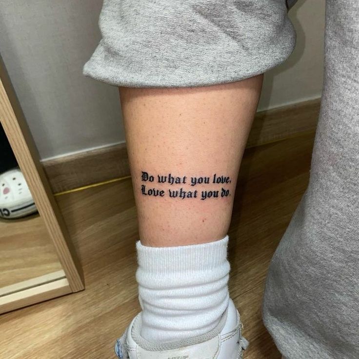 a person with a tattoo on their leg saying do what you love, i love wish you're