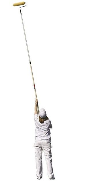 a person in white is holding onto a pole with a broom on it's head