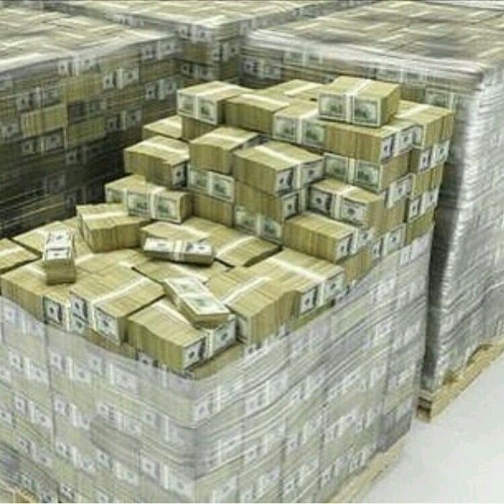 stacks of money sitting on top of each other