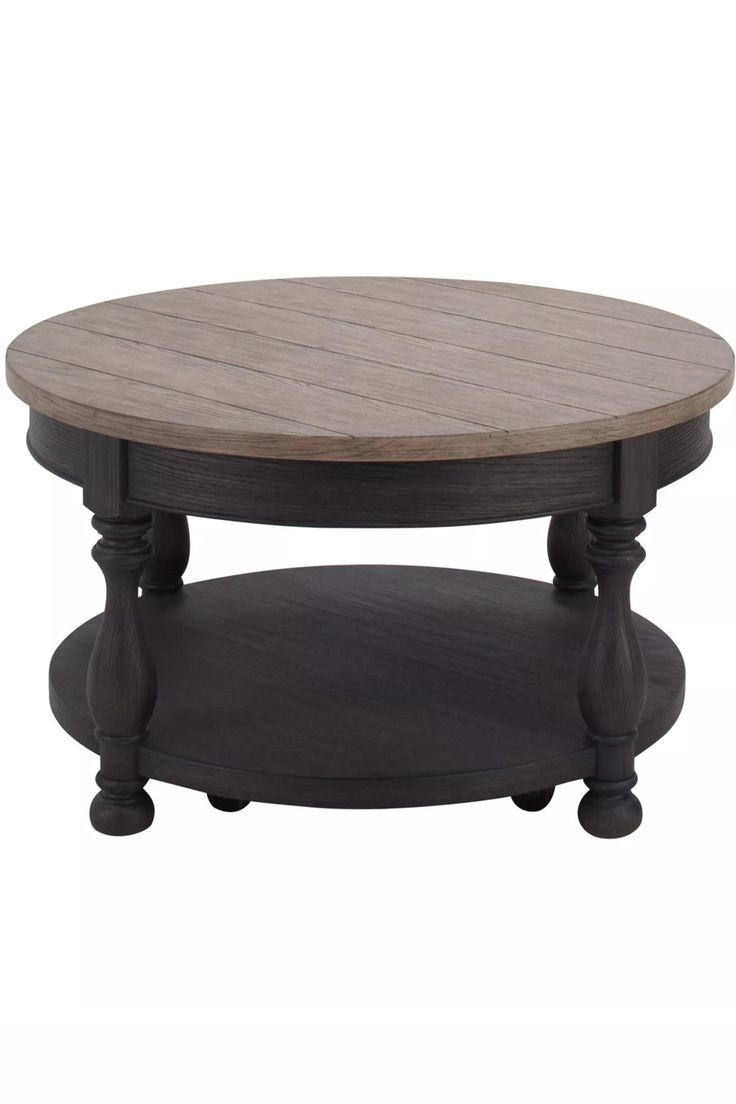 an oval wooden table with wheels on the bottom and two small round bases in grey wood