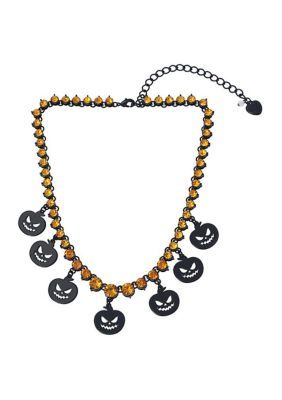 Glistening orange tennis necklace featuring festive pumpkin charms at front. Necklace has an adjustable lobster clasp closure. Made from metal and glass. | Betsey Johnson Pumpkin Bib Necklace, Orange Stone Pumpkin, Halloween Beaded Jewelry, Pumpkin Necklace, Pumpkin Cat, Necklace Orange, Cat Pendant Necklace, Glitter Pumpkins, Halloween Necklace, Cat Pendant