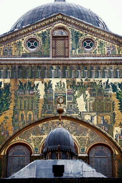 an ornate building with many designs on it