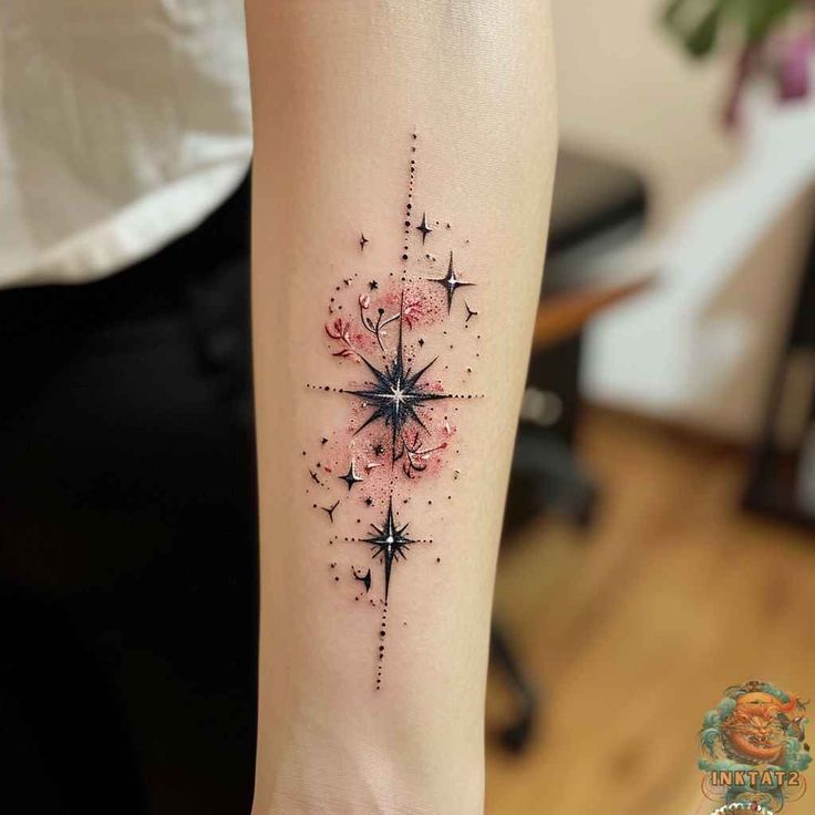 a woman's arm with a star tattoo on it