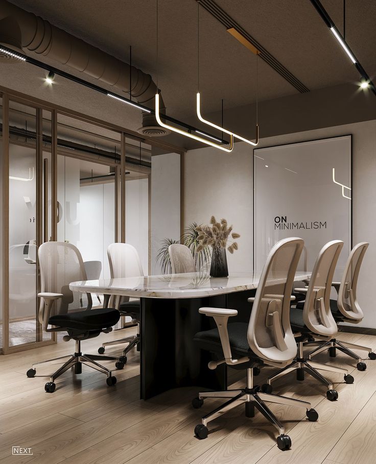 an office meeting room with white chairs and a round table in front of glass walls