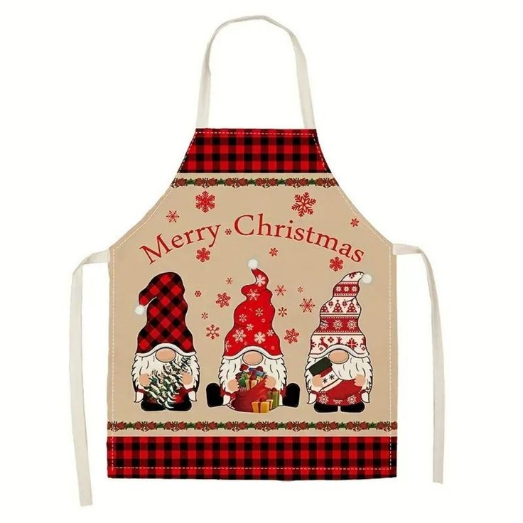 an apron with santa claus and other christmas decorations on the front, featuring two gnomes