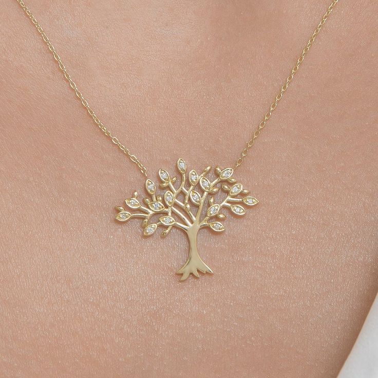 Tree of Life Necklace, Diamond Pendant with Solid Gold * Handmade Fine Jewelry * Material: 18K Gold * Gemstone: Round Diamond * Diamond Weight: 0,13 ct Round * Color-Clarity: G Vs * Certificated Product * Beautifully Packaged Elegant Tree Of Life Jewelry For Anniversary, Elegant Tree Of Life Necklace For Anniversary, Elegant White Gold Tree Of Life Jewelry, Tree Of Life Pendant Necklaces For Anniversary, 14k Yellow Gold Tree Of Life Jewelry, Elegant Gold Necklace With Tree Of Life, Tree Of Life Necklace Gold, Elegant Gold Tree Of Life Jewelry, Elegant Yellow Gold Tree Of Life Jewelry