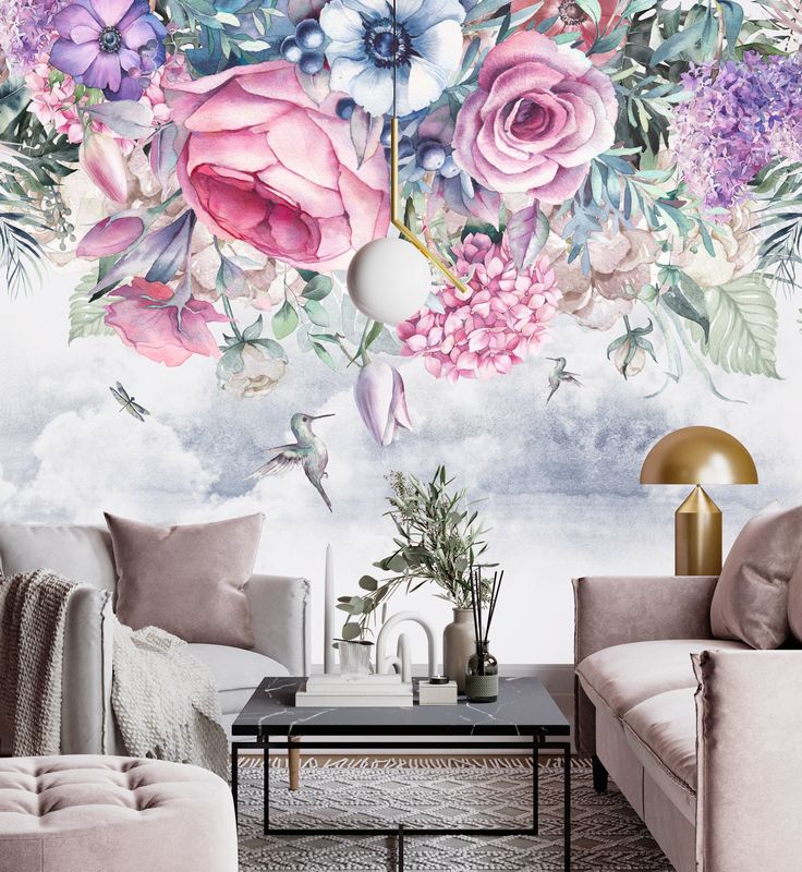 a living room with pink flowers on the wall