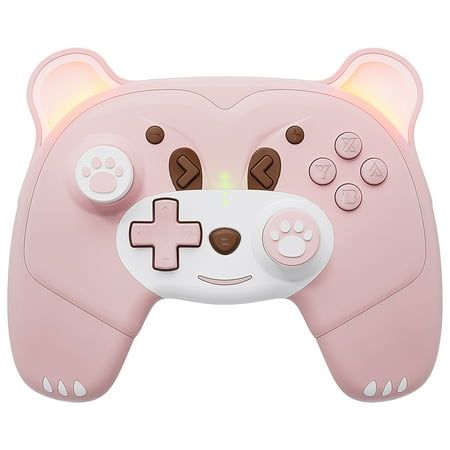 a close up of a nintendo wii game controller with a bear face on the front