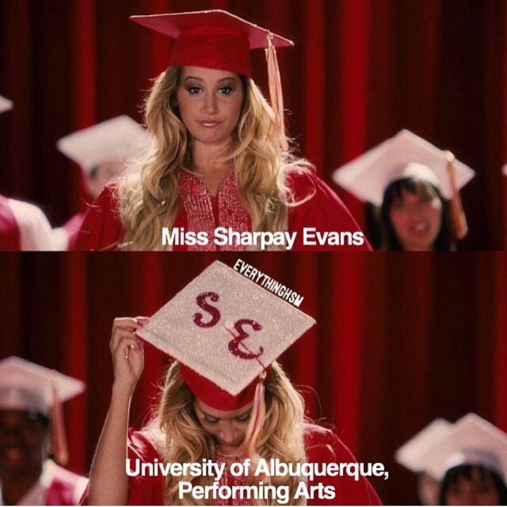 a woman in graduation cap and gown holding up a sign that says, miss sharpey evans