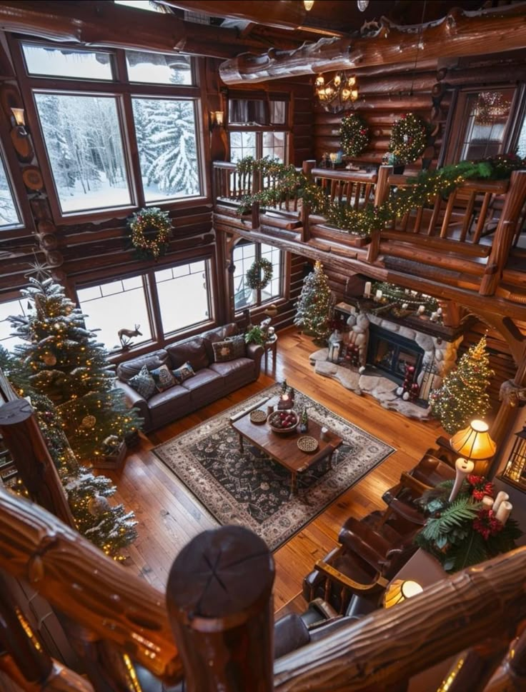 a large living room filled with furniture and christmas decorations