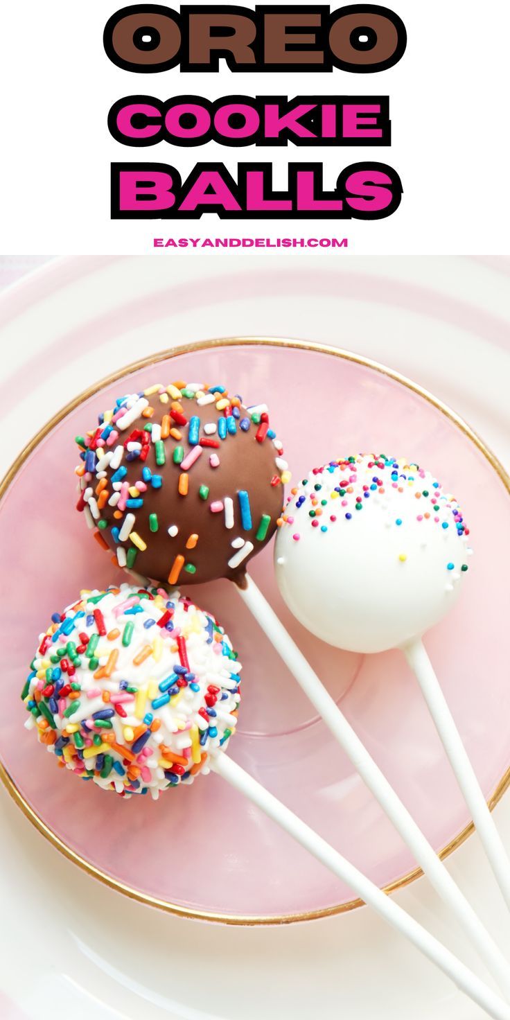 three cake pops on a plate with sprinkles