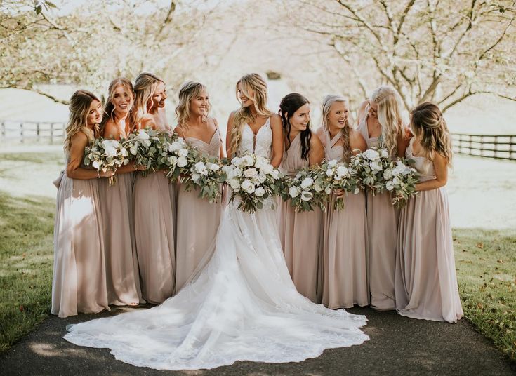 a group of women standing next to each other