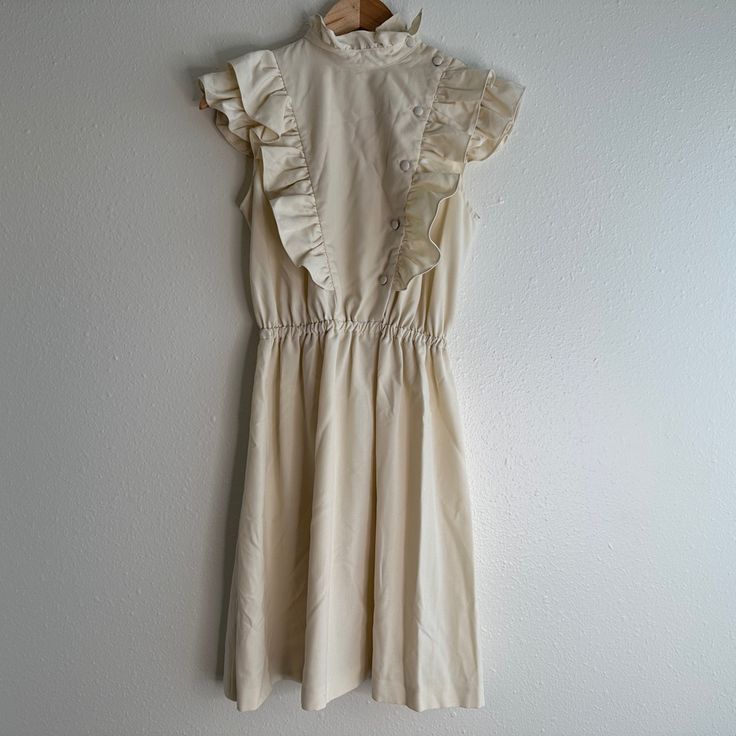 Brand New Without Tag. Purchased Quite A While Ago And Has Been Sitting In My Closet Since, Unworn. The High Neck And Ruffle Button Detail Make This A Statement Piece. 70% Cotton Blend Size Small Feminine Cream Cotton Midi Dress, Casual Beige Midi Dress With Lace Trim, Sleeveless Beige Vintage Dress For Summer, Beige Sleeveless Vintage Dress For Summer, Beige Sleeveless Summer Vintage Dress, Cream Midi Dress With Lace Trim For Day Out, Beige Cottagecore Vintage Dress For Summer, Cottagecore Beige Midi Dress, Beige A-line Midi Dress With Lace Trim