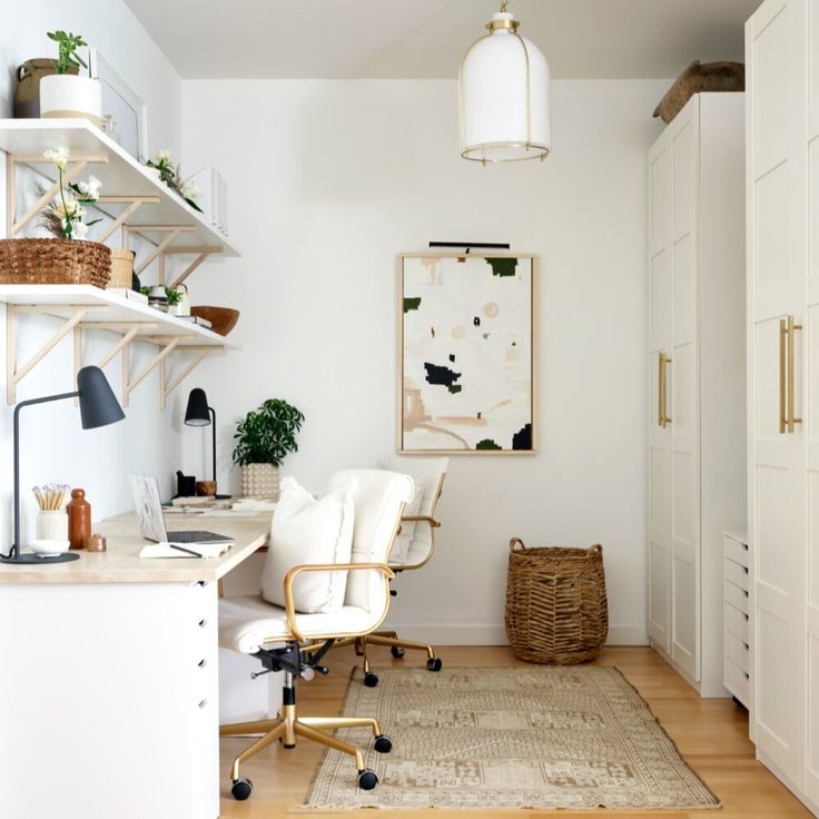 an office with white walls and wooden floors is featured in the article small and cozy rental condo photos