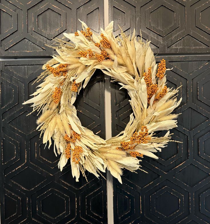 a close up of a wreath on a door