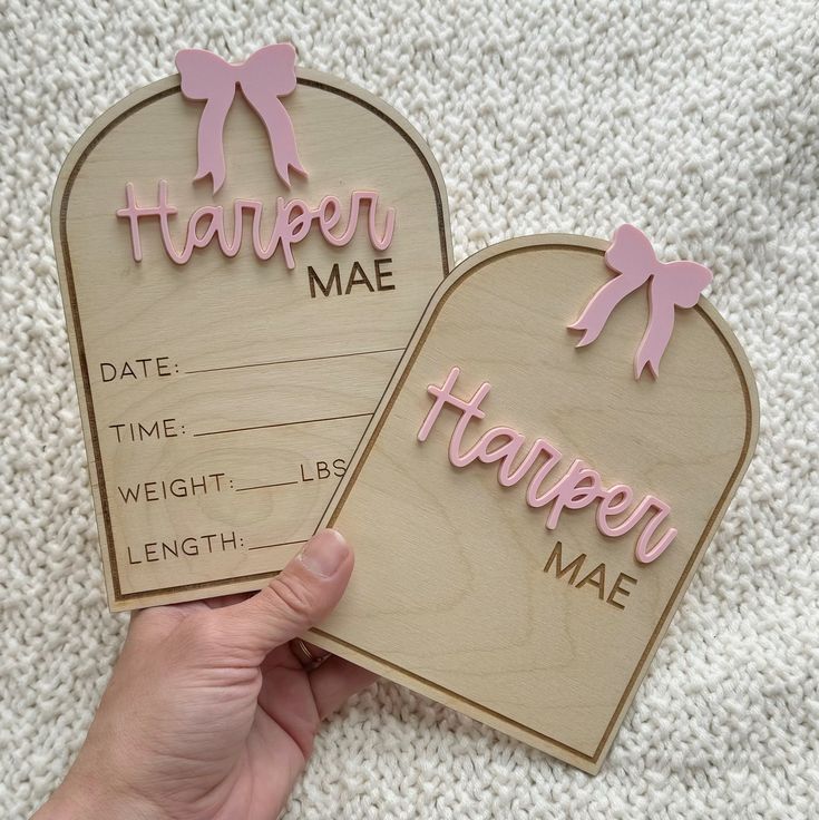 two wooden heart shaped magnets with the words happy valentine and harper mae on them