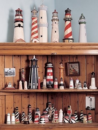 there are many lighthouses on the shelves in this room